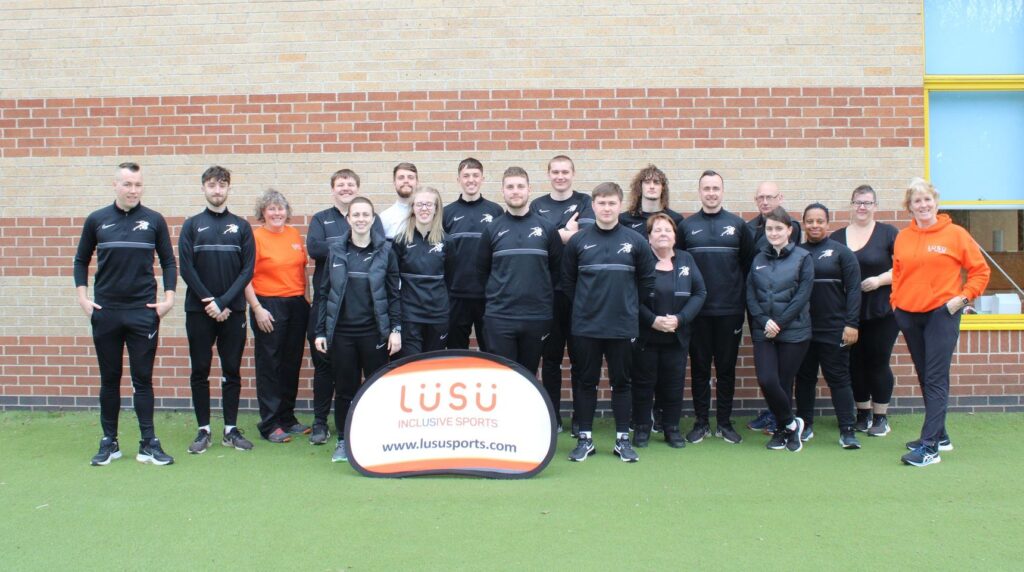 Photo showing the team of TB Sport coaches and LUSU Sports lining up for a photo